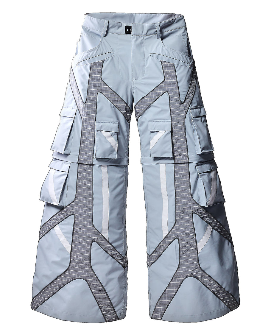 Light blue snow pants with geometric patterns on a white background