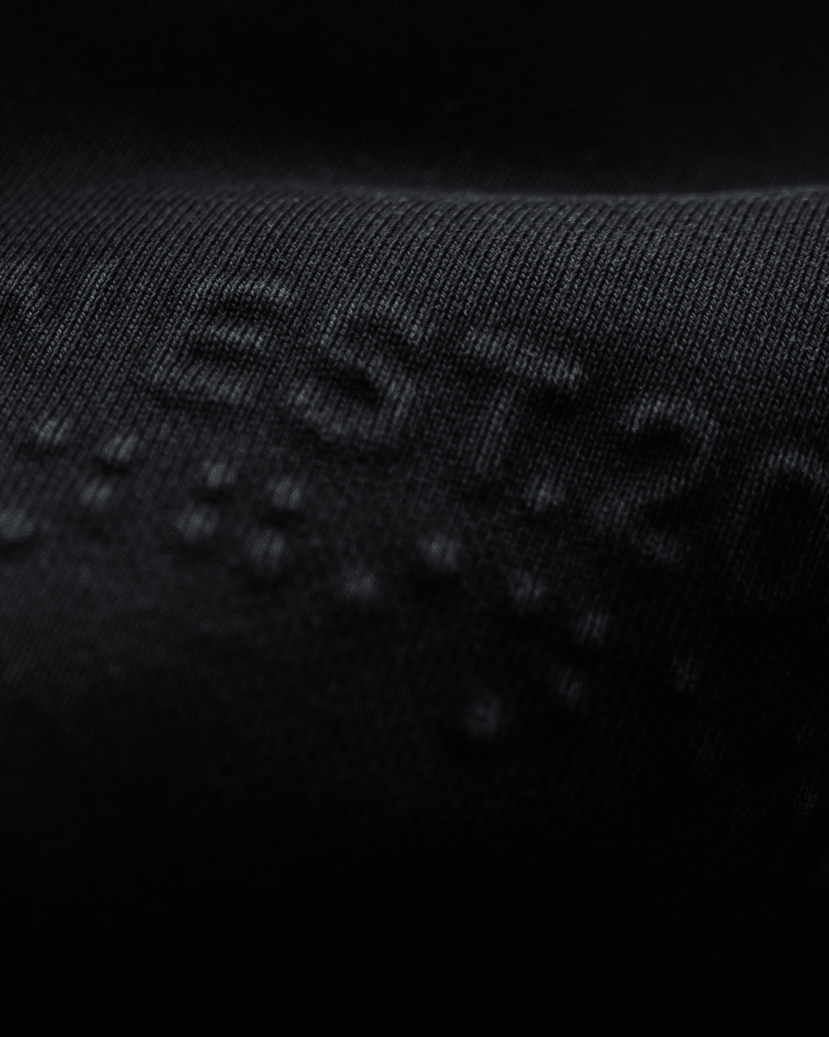 NOOON EMBOSSED HOODIE